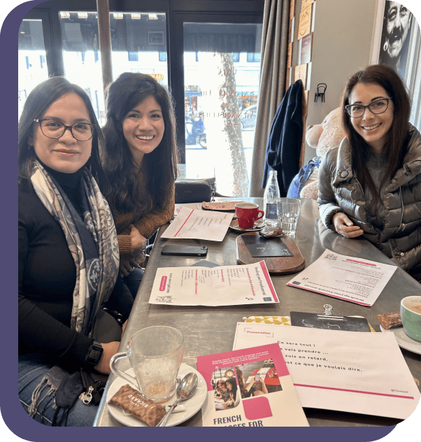 Three friends sharing a FrenchUp semi private class in Paris.